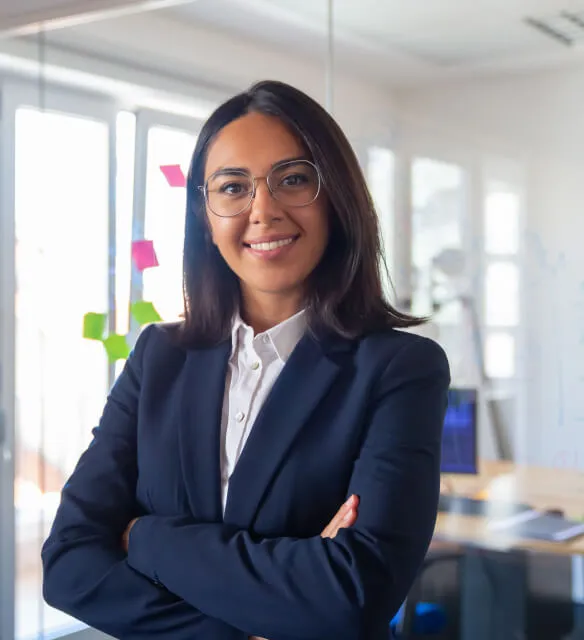 Stacked cardboard boxes on a recycling bin for commercial waste disposal services.