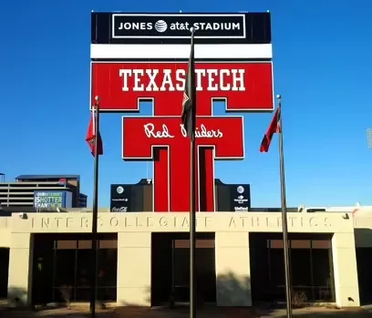 Stacked cardboard boxes on a recycling bin for commercial waste disposal services.