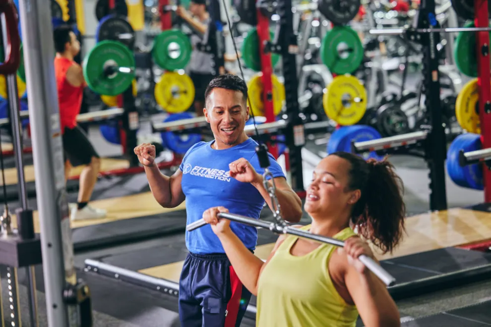Woman performing pulls for strength training