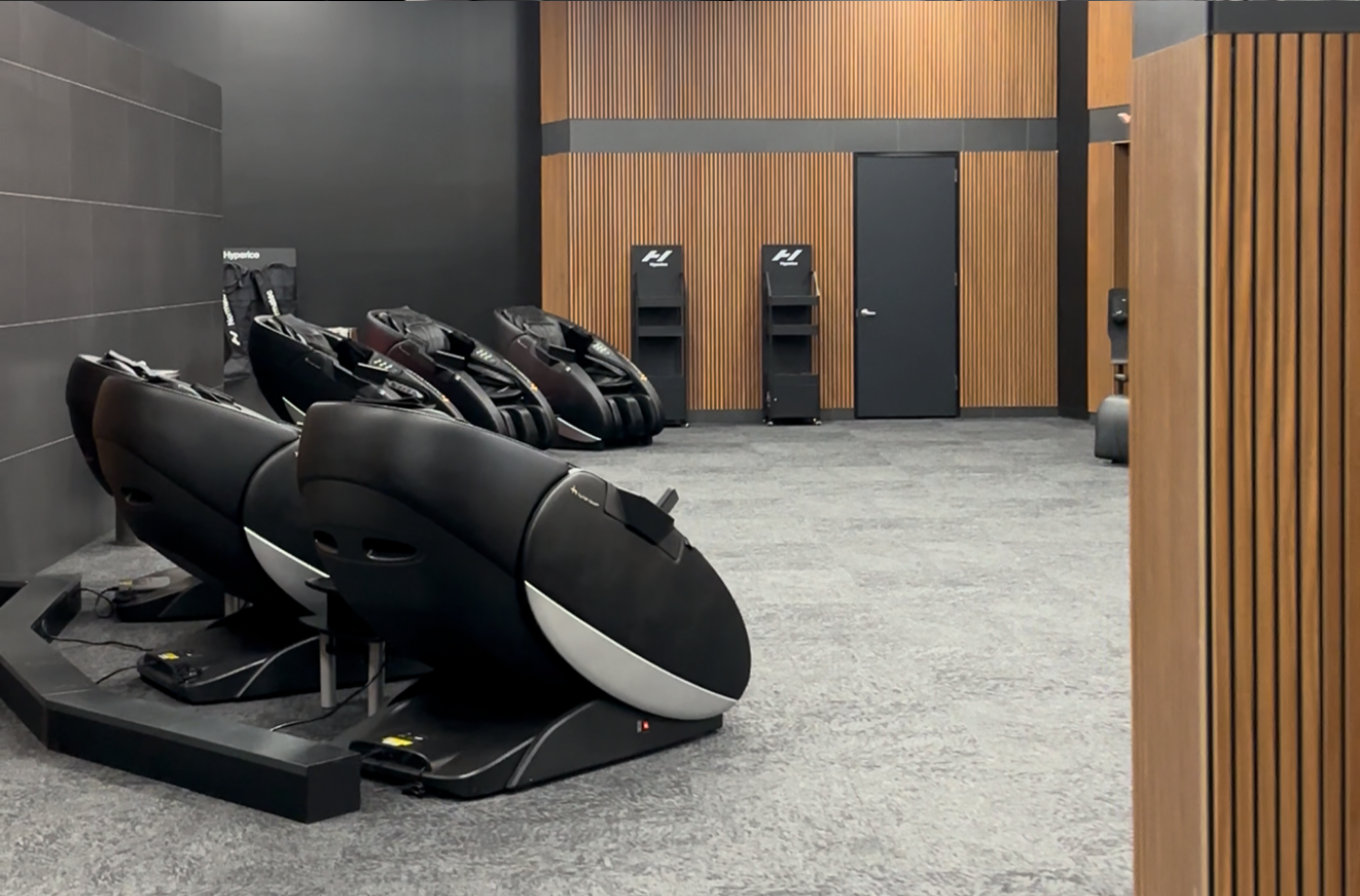 gravity and massage chairs in a recovery lounge