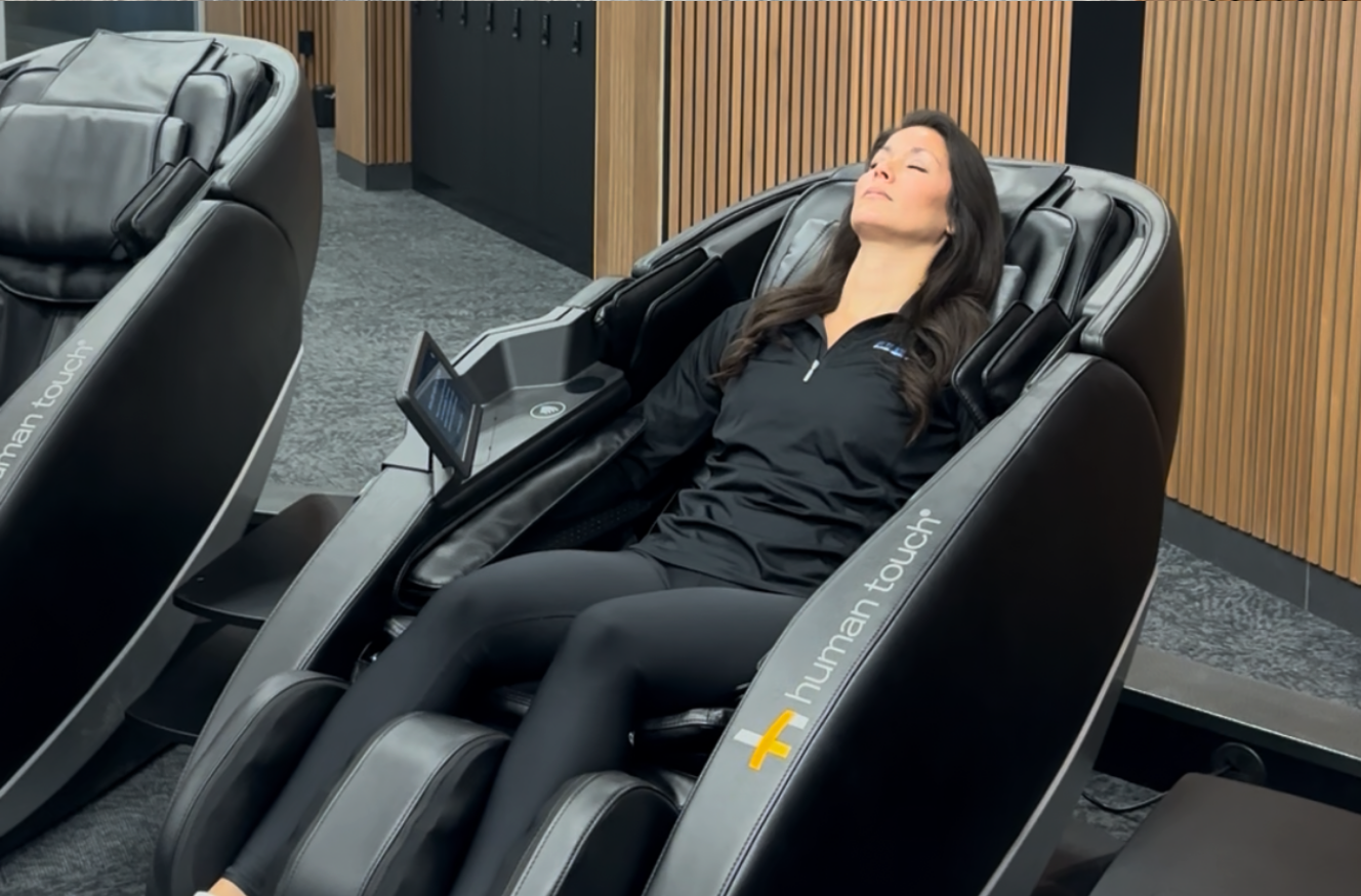 woman sitting in a massage chair