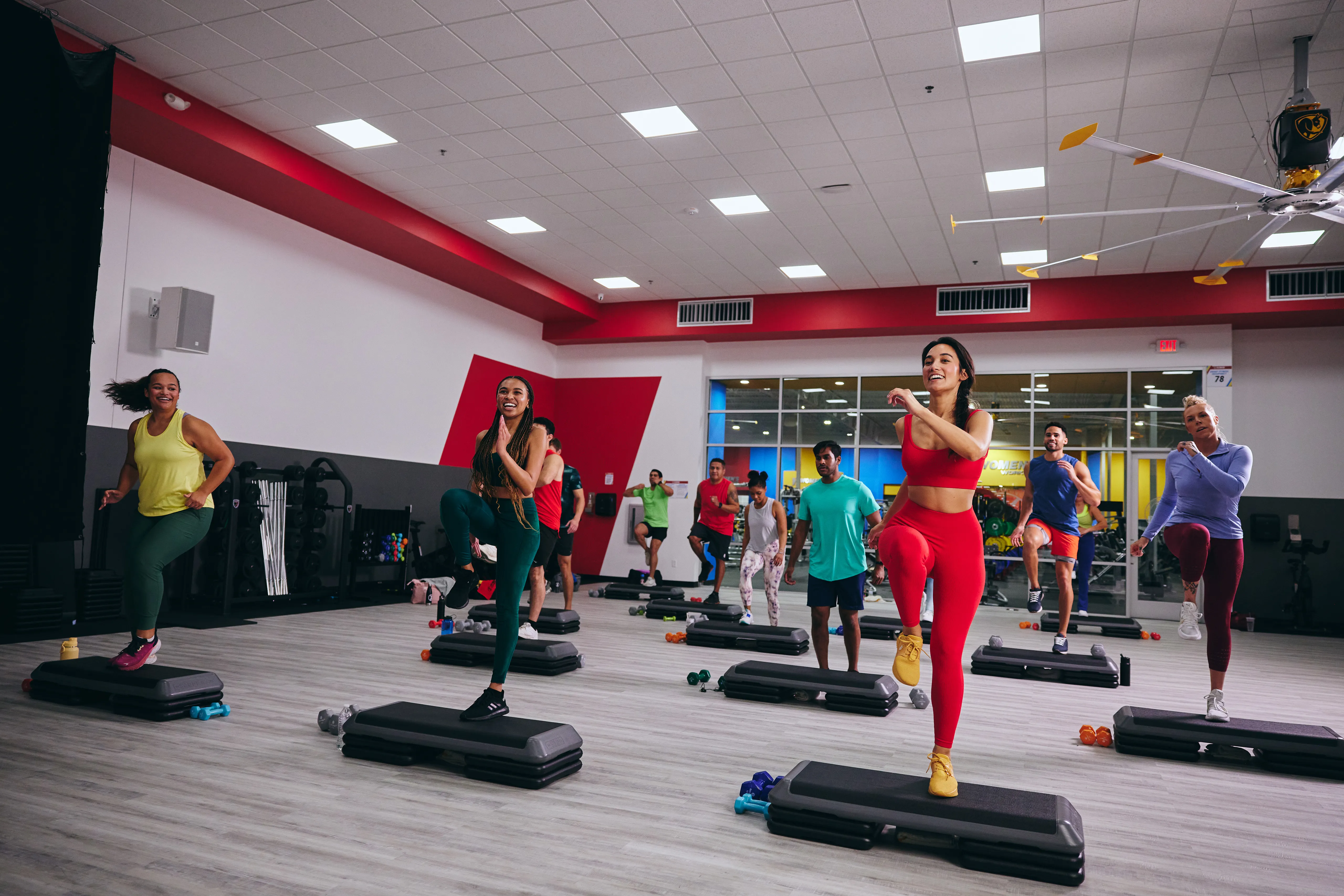A group of people working out in a Fitness Connection group fitness studio
