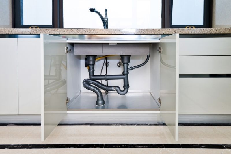 Open cabinet doors under sinks to circulate warm air.