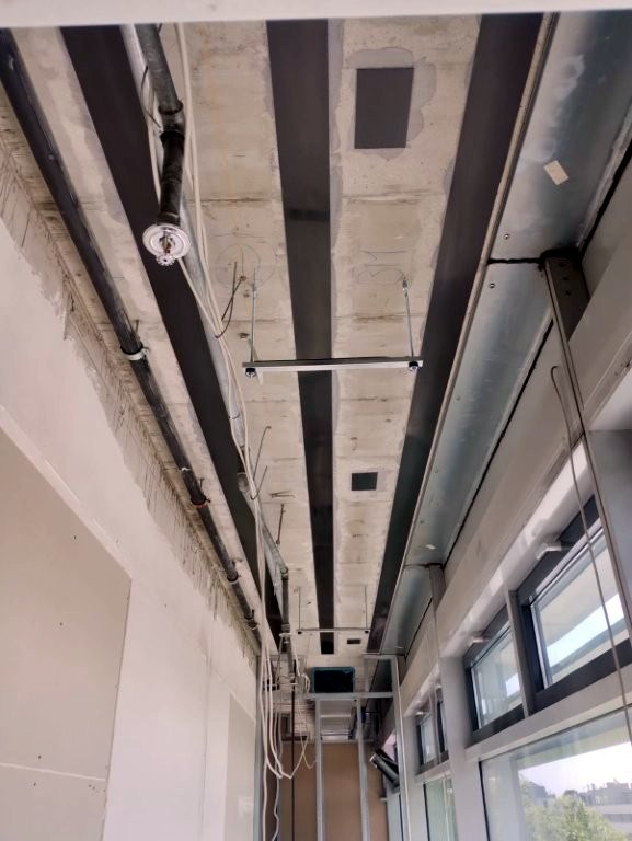 Mit CFK-Lamellen verstärkte Decke im Innenbereich des IZD-Towers