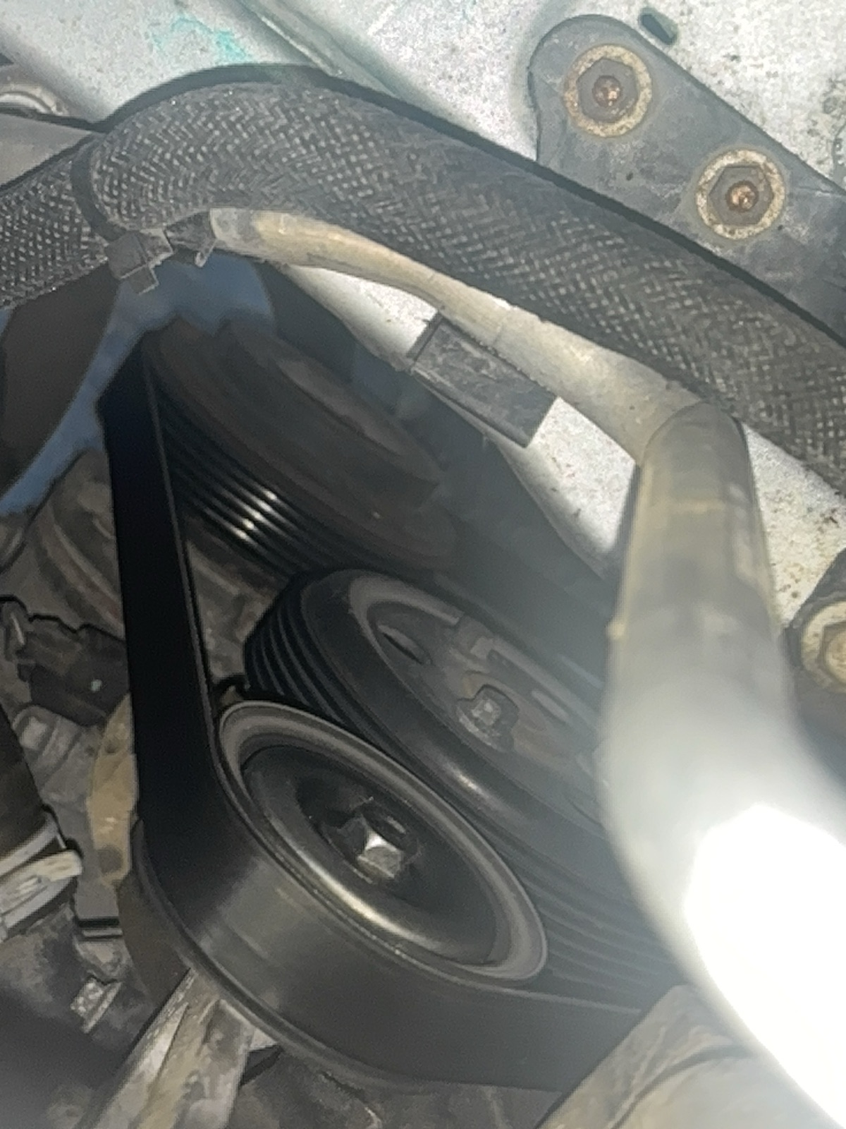 2012 Ford Escape XLT parked on street in Omaha after serpentine belt and tensioner replacement to fix engine squealing noise from worn belt