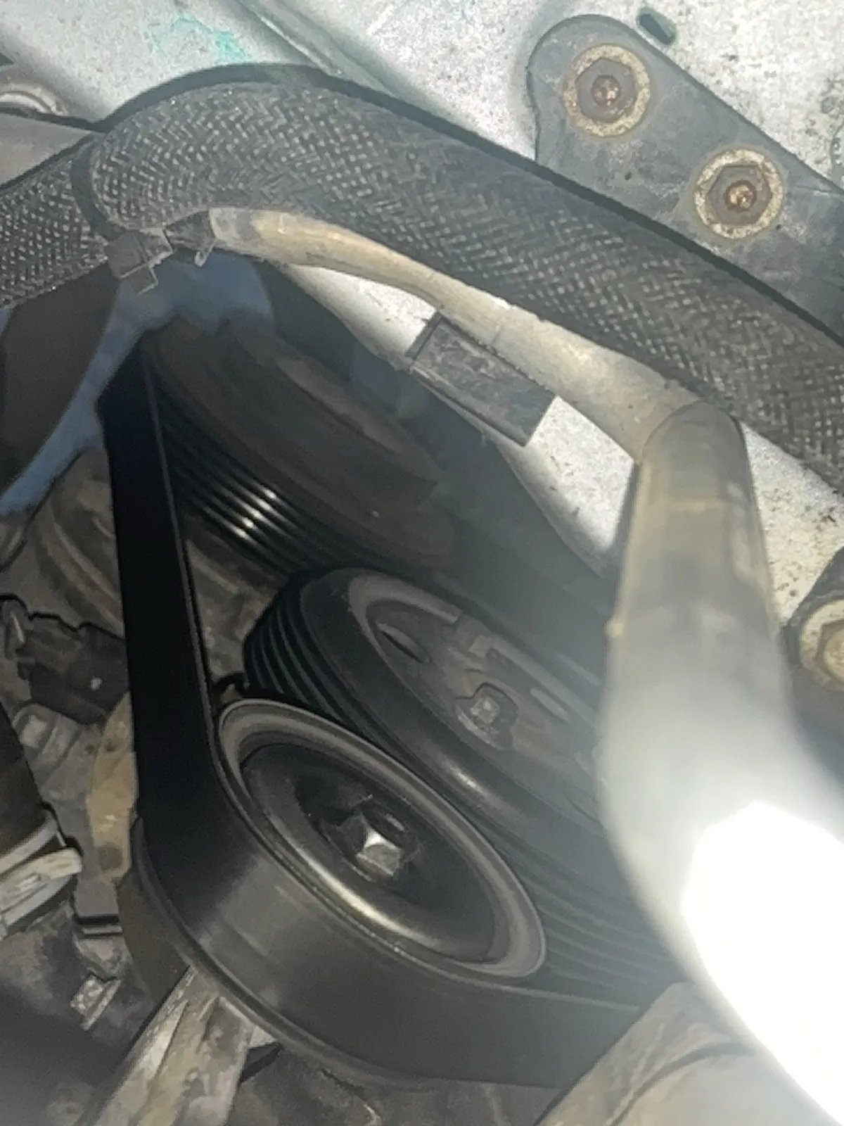 2012 Ford Escape XLT parked on street in Omaha after serpentine belt and tensioner replacement to fix engine squealing noise from worn belt