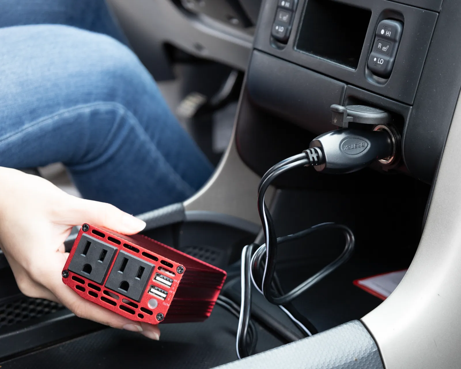 Power inverter plugged into a car outlet