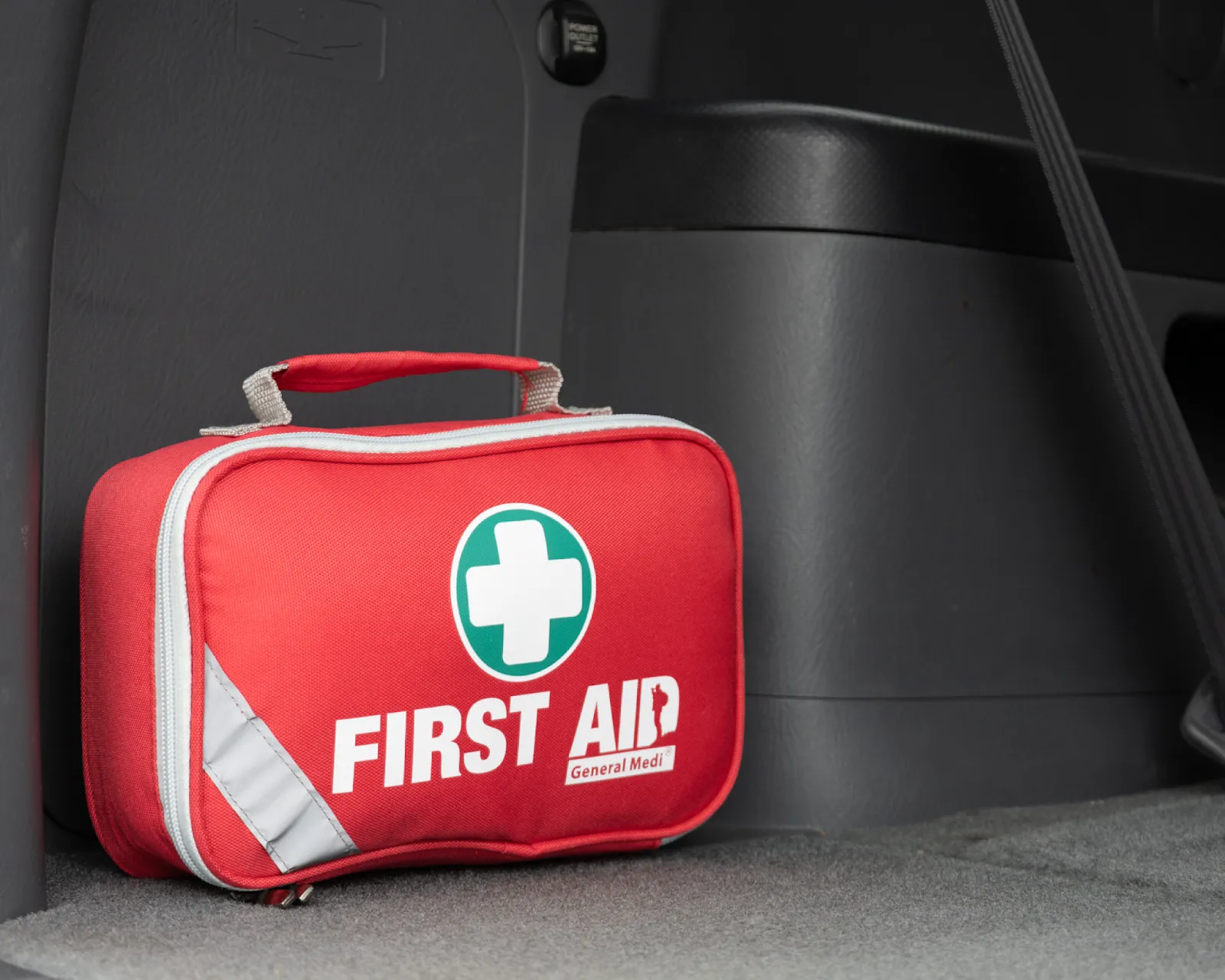First aid kit in a car trunk