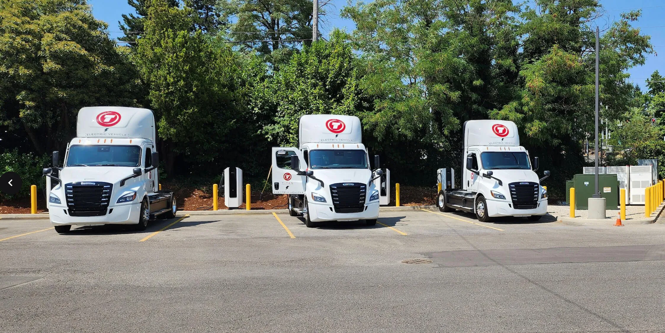 Three Titan Freight heavy-duty electric trucks