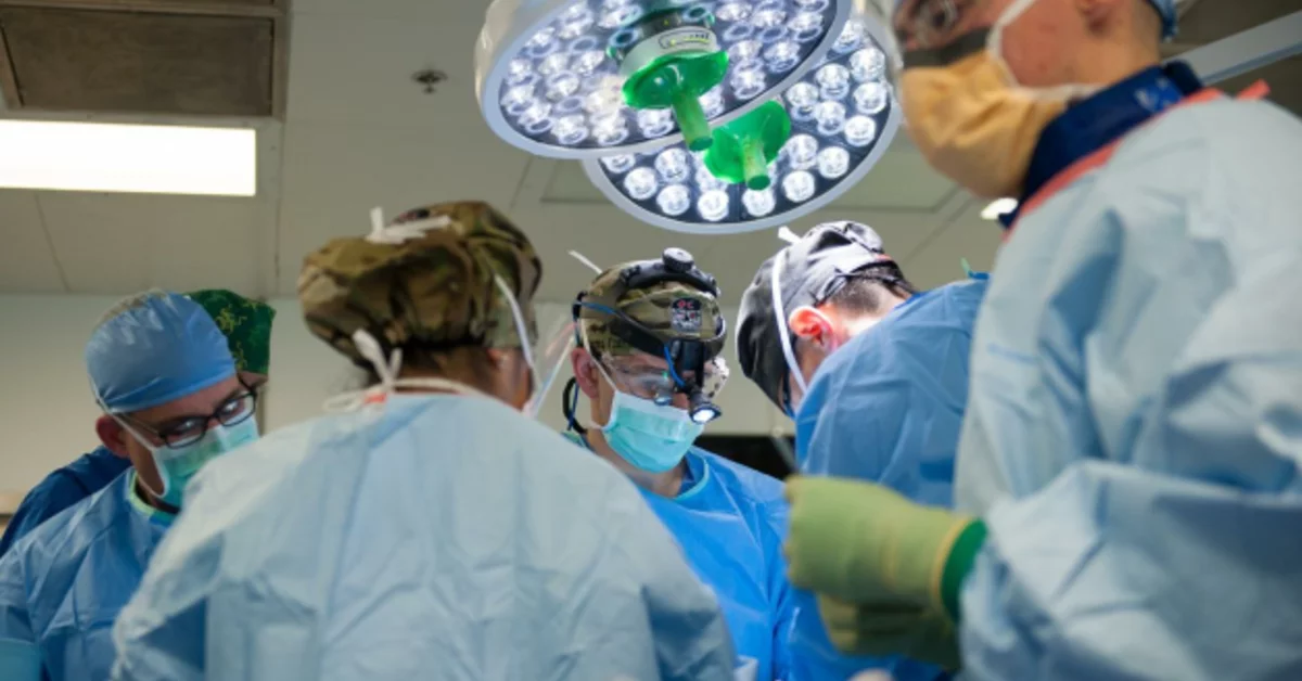 Group of surgeons working on a patient