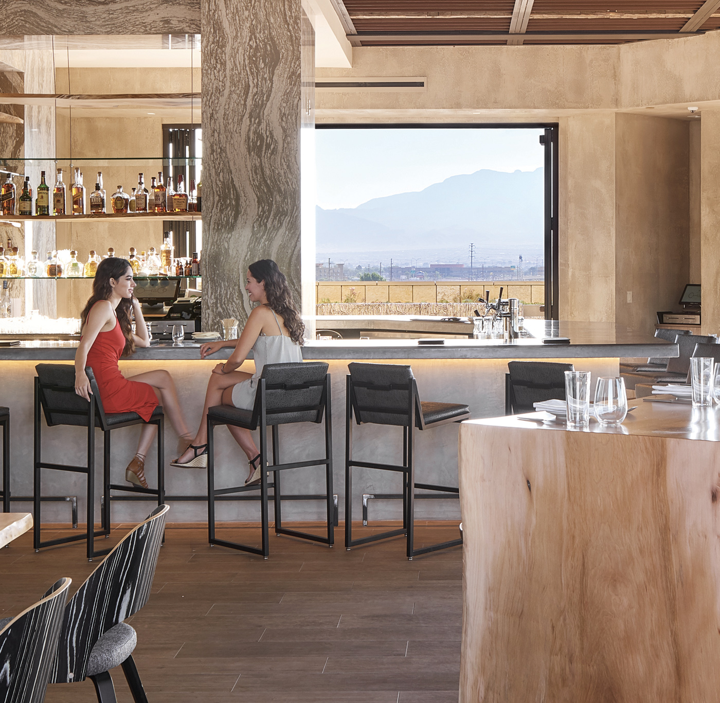 Level 5 Rooftop bar and restaurant with two ladies sitting at bar