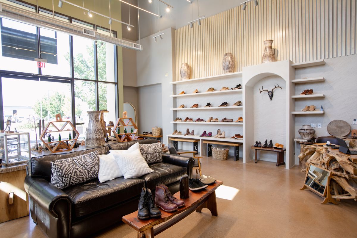 Interior of XOL Original handmade show store inside Hotel Chaco with various footwear