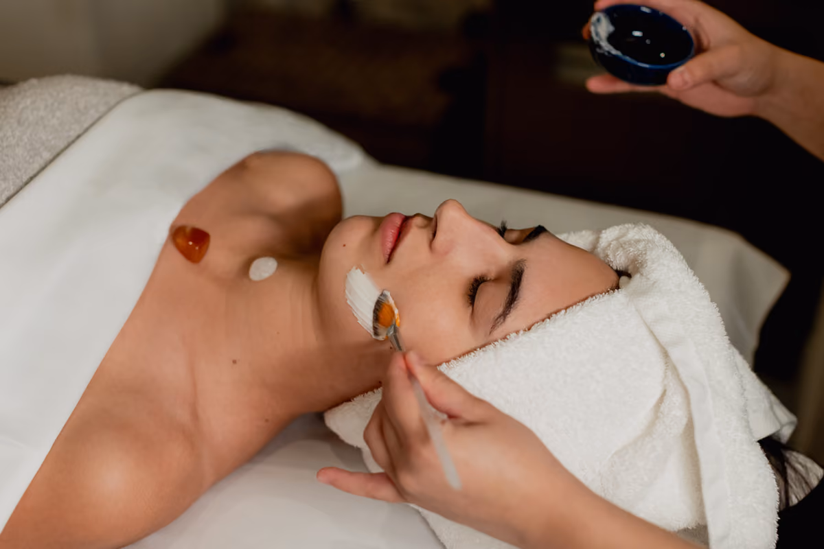 Woman receiving a facial