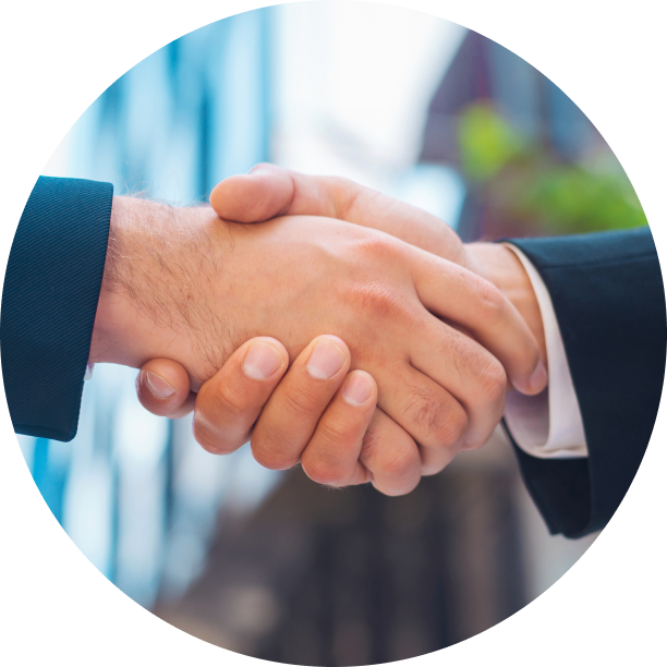 Two employees shaking hands comfortly as an occupants