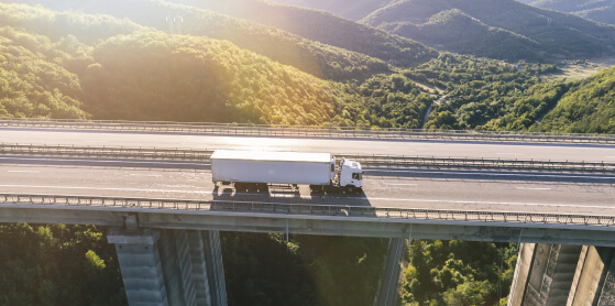 Truck on a bridge areal shot 