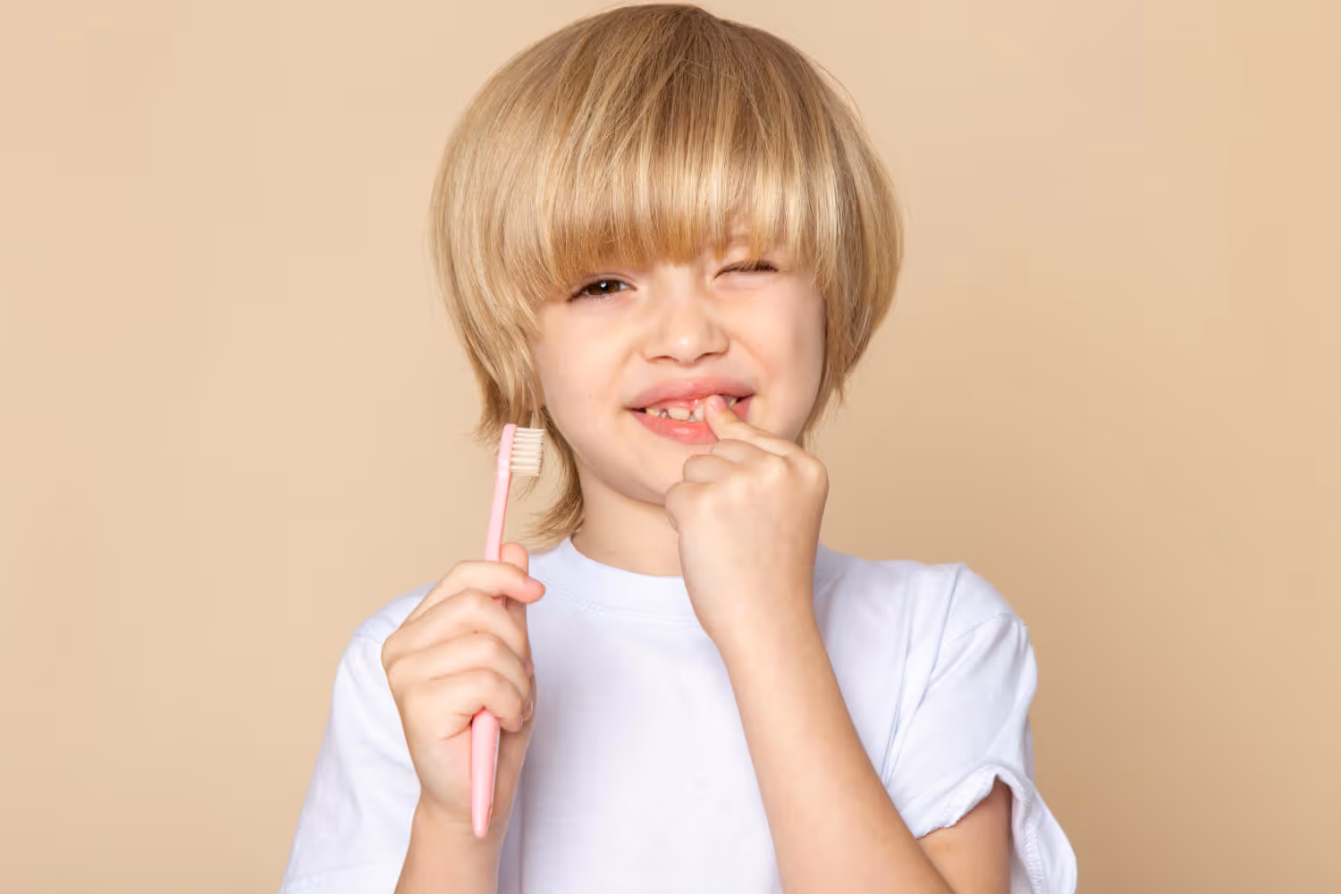 Why do dentists sometimes advise waiting until all the permanent teeth are out before doing anything?