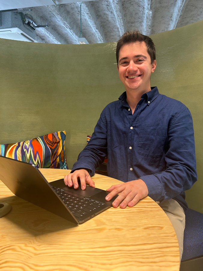 Léonard of Sailpeak working on his computer
