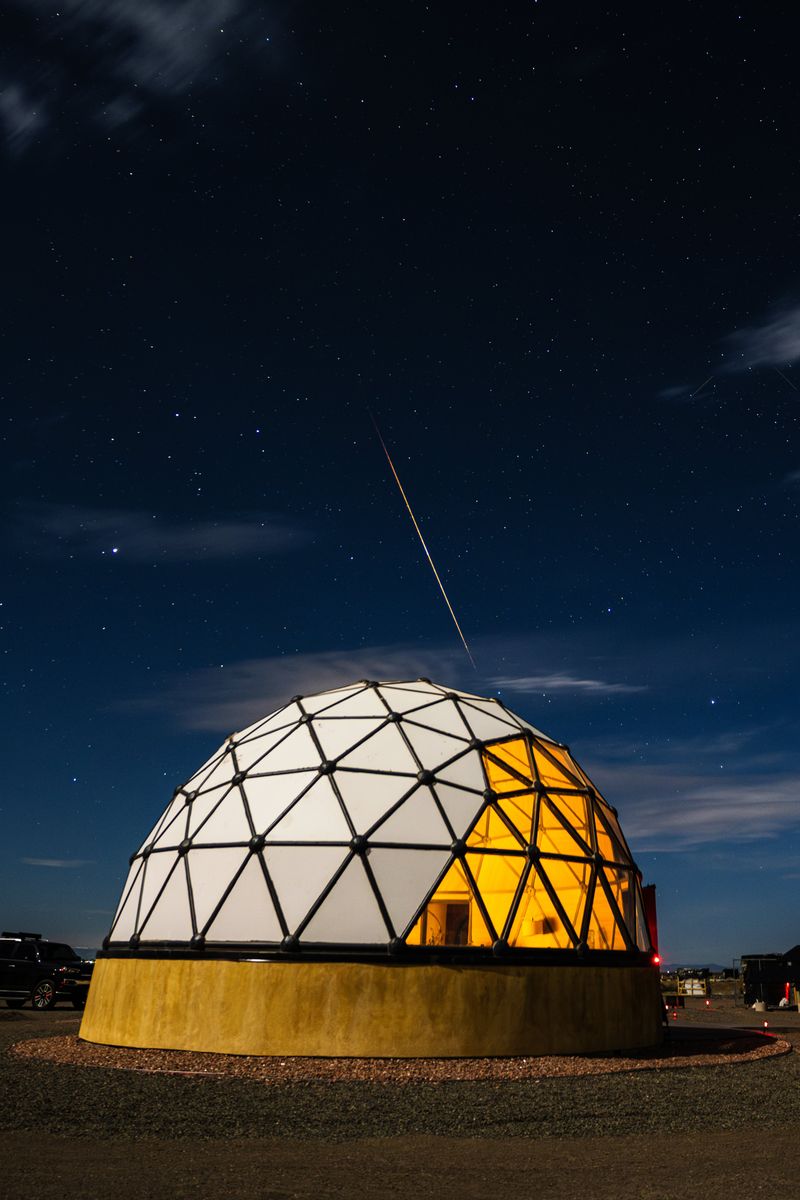 Red meteor over the Kosmos dome