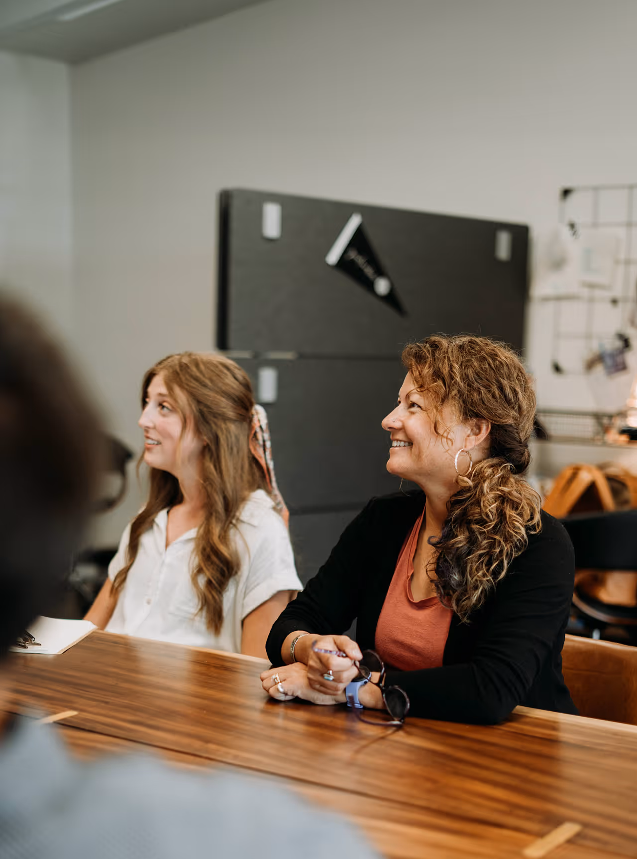 Women listening in meeting