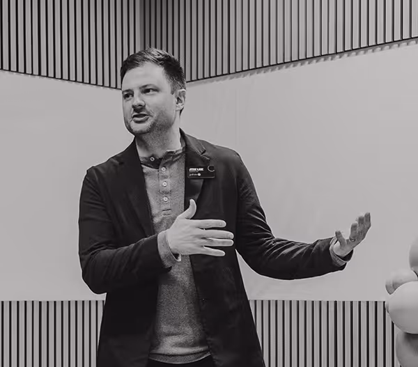 Man explaining in meeting