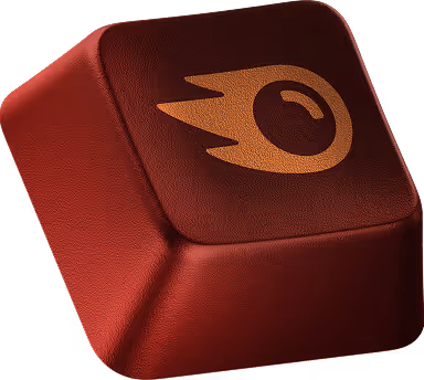 Touche de clavier rouge avec un symbole orange de boule enflammée.