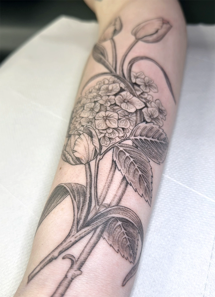 fine line bkinky tattoo