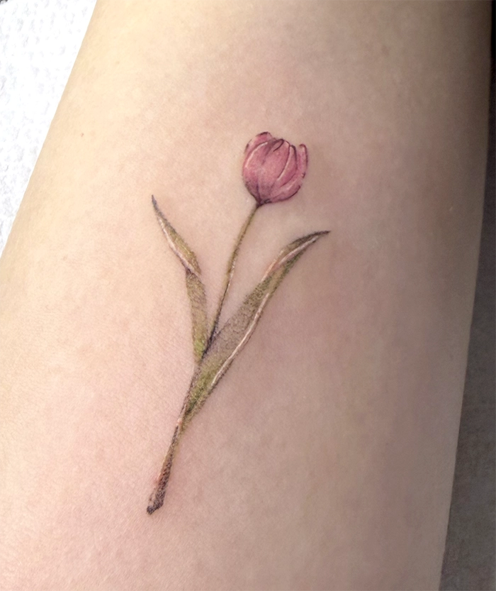 fine line bkinky tattoo