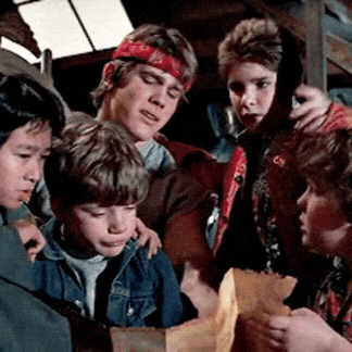 Three musicians from the 1990's dancing and having a good time