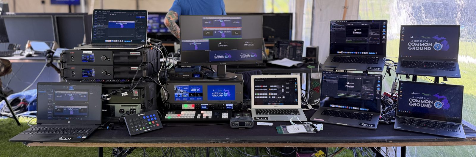 Creative Day audio and video control gear staged on a table outdoors