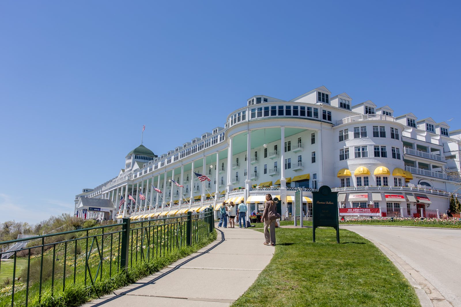 The Grand Hotel long white facade and porch on a sunny day