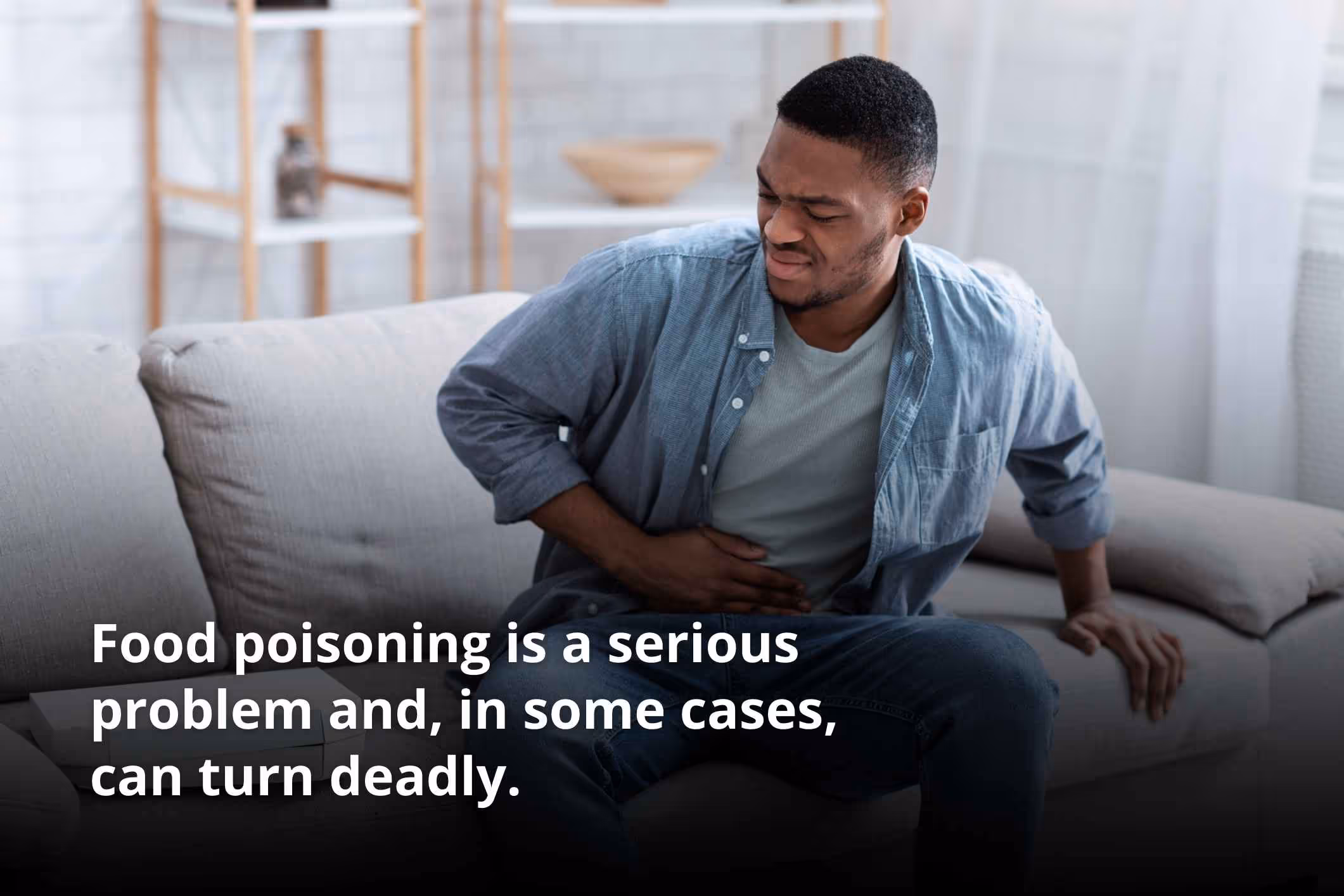 A man clutches his stomach and considers suing for food poisoning.
