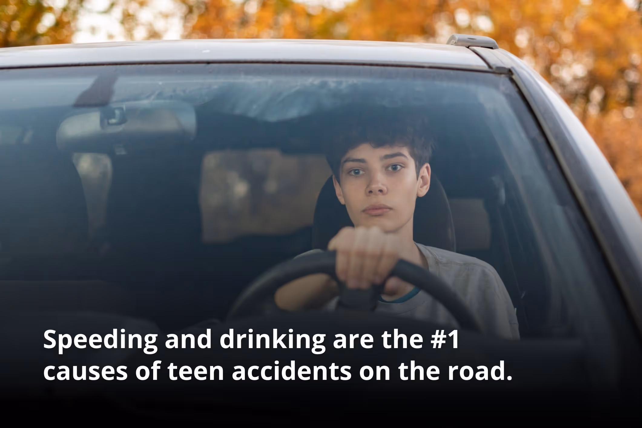A teenager driving while thinking about the conversation he had with his parents on teen driving statistics.