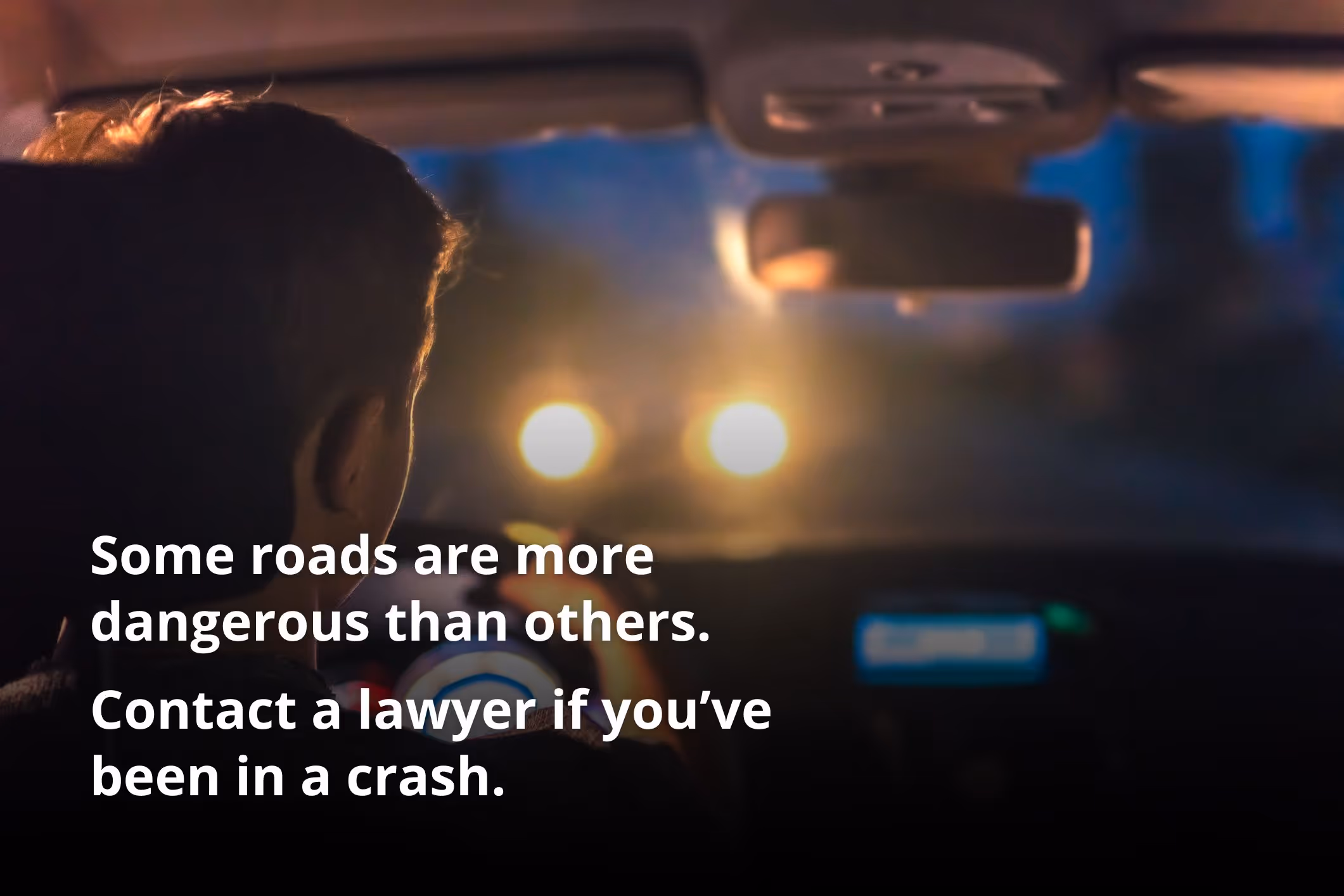 A driver about to crash head on with another car.