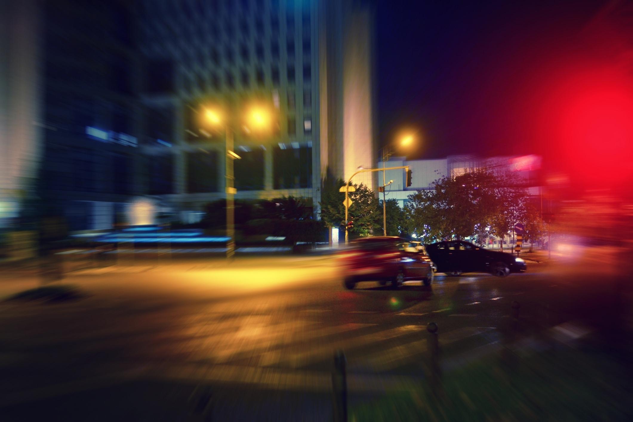 Car running through red light.