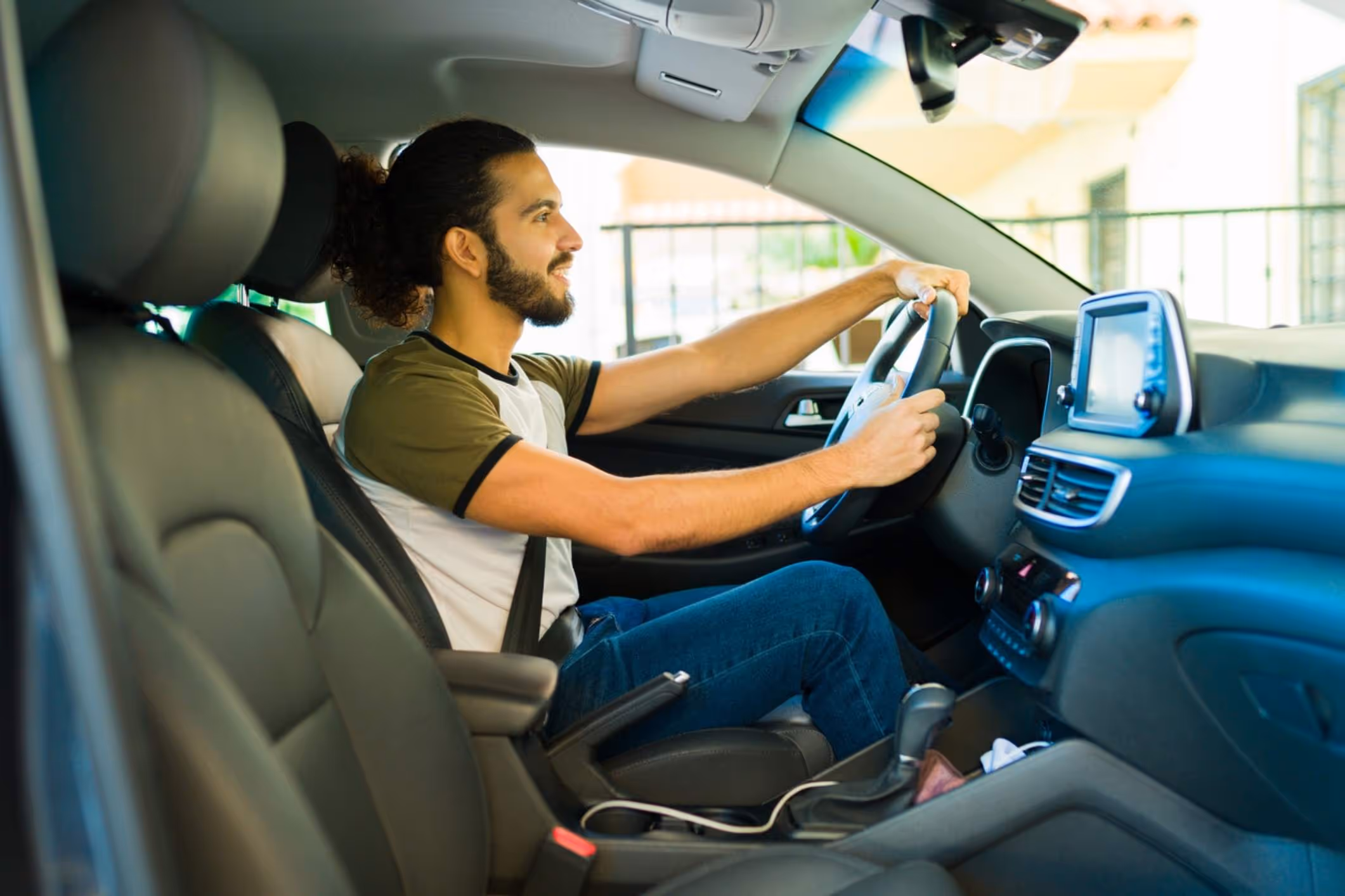 Rideshare driver behind the wheel, representing a car accident while driving for Lyft.