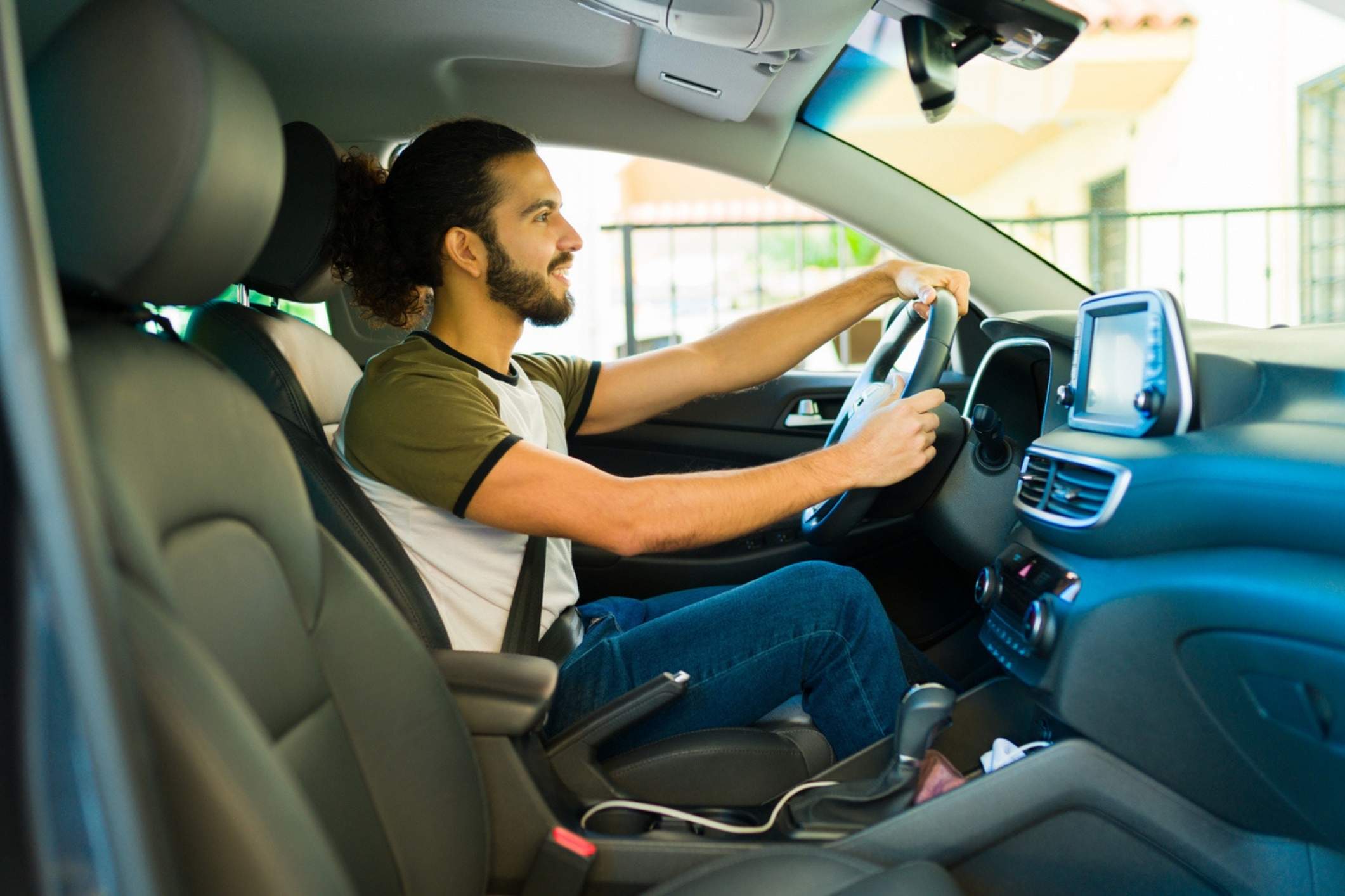 Rideshare driver behind the wheel, representing a car accident while driving for Lyft.