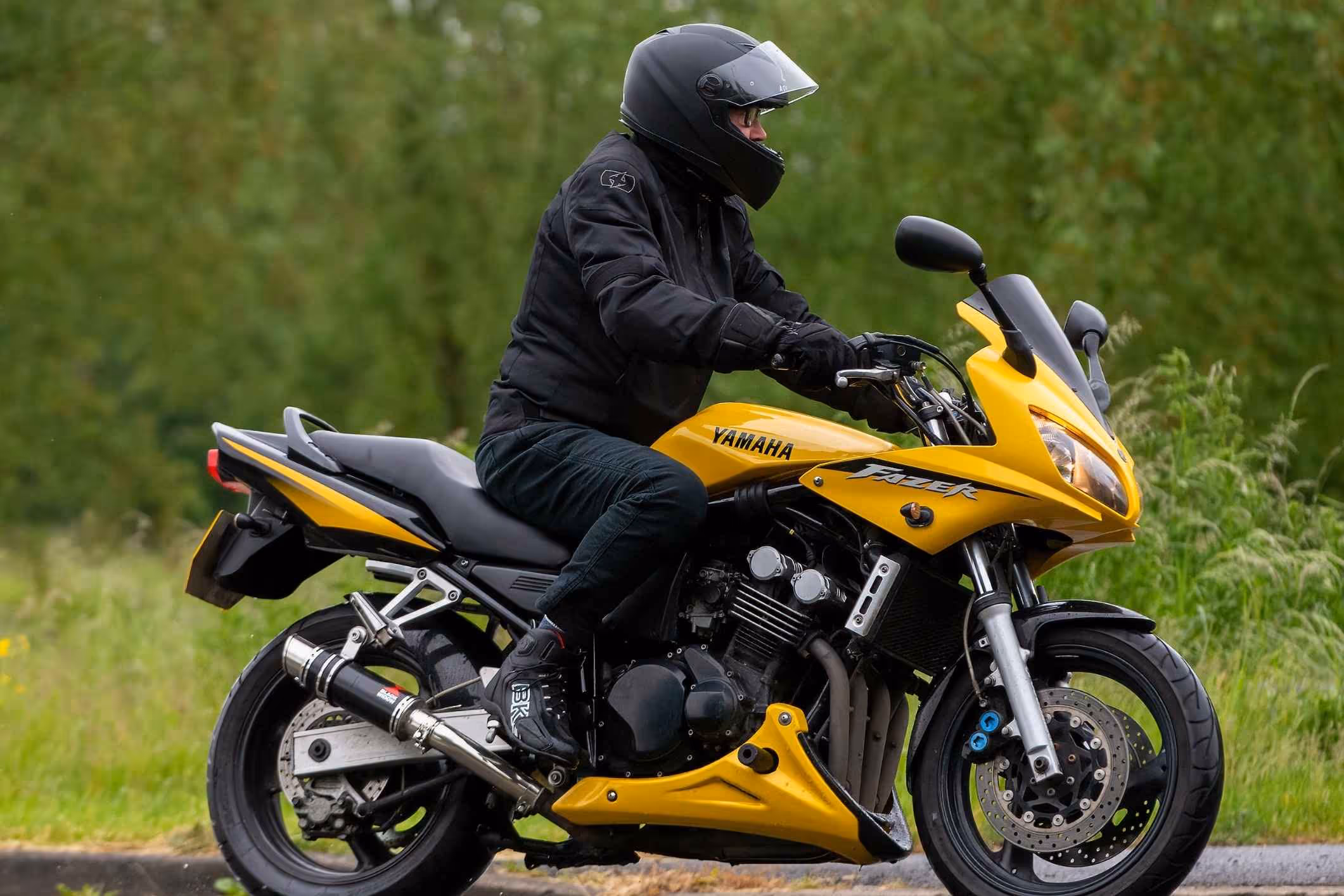 Yamaha motorcycle on road, representing Virginia Beach motorcycle accident lawyer injury cases.