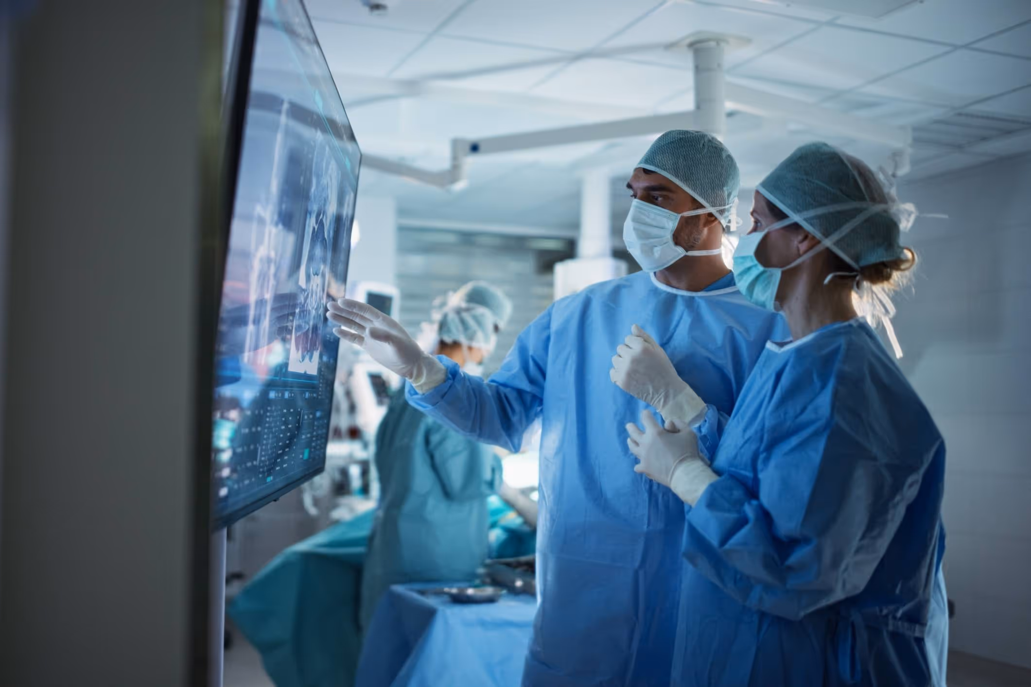 Doctors after the surgery on a patient who wasn't informed about it.