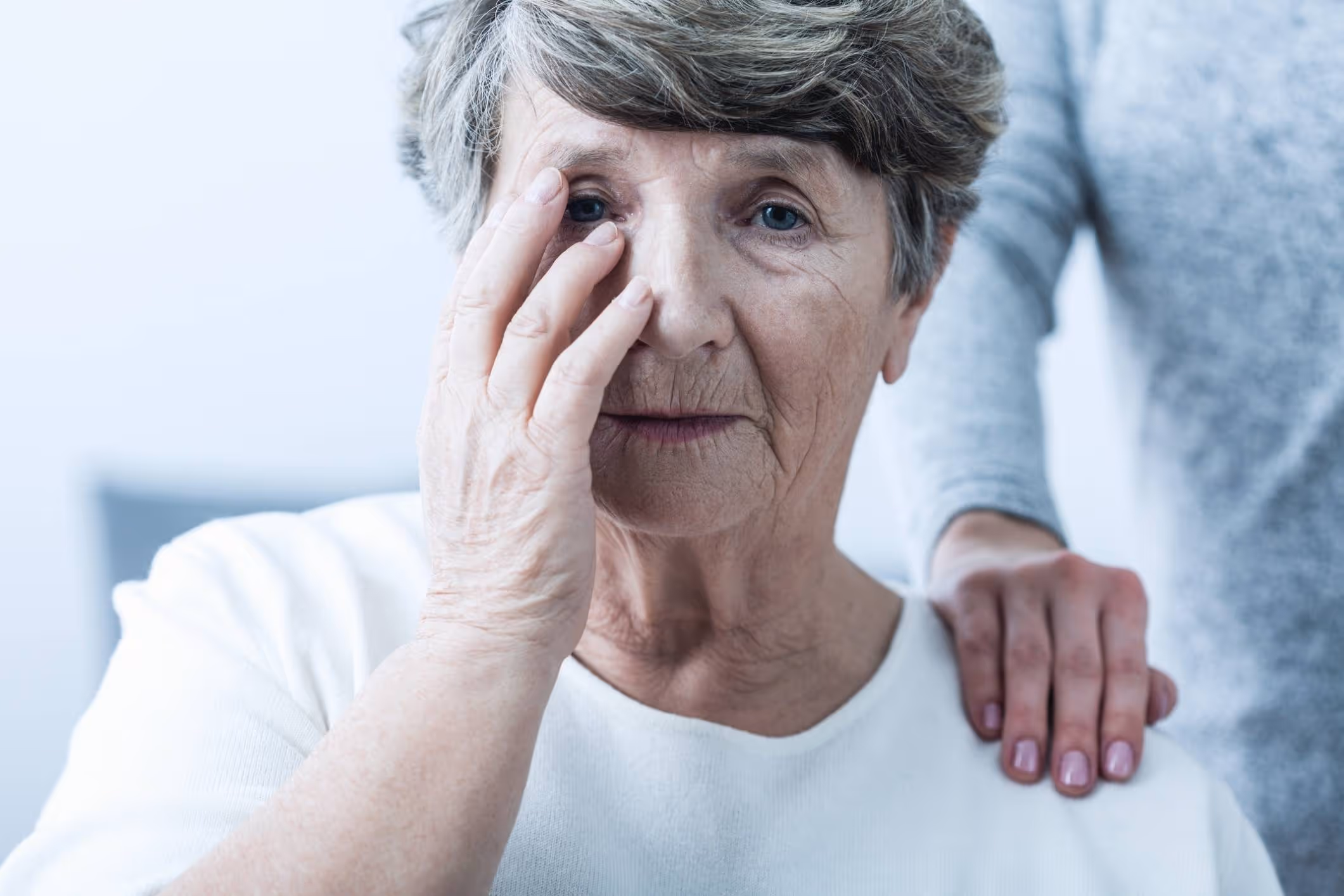 Old woman is suffering from nursing home abuse.