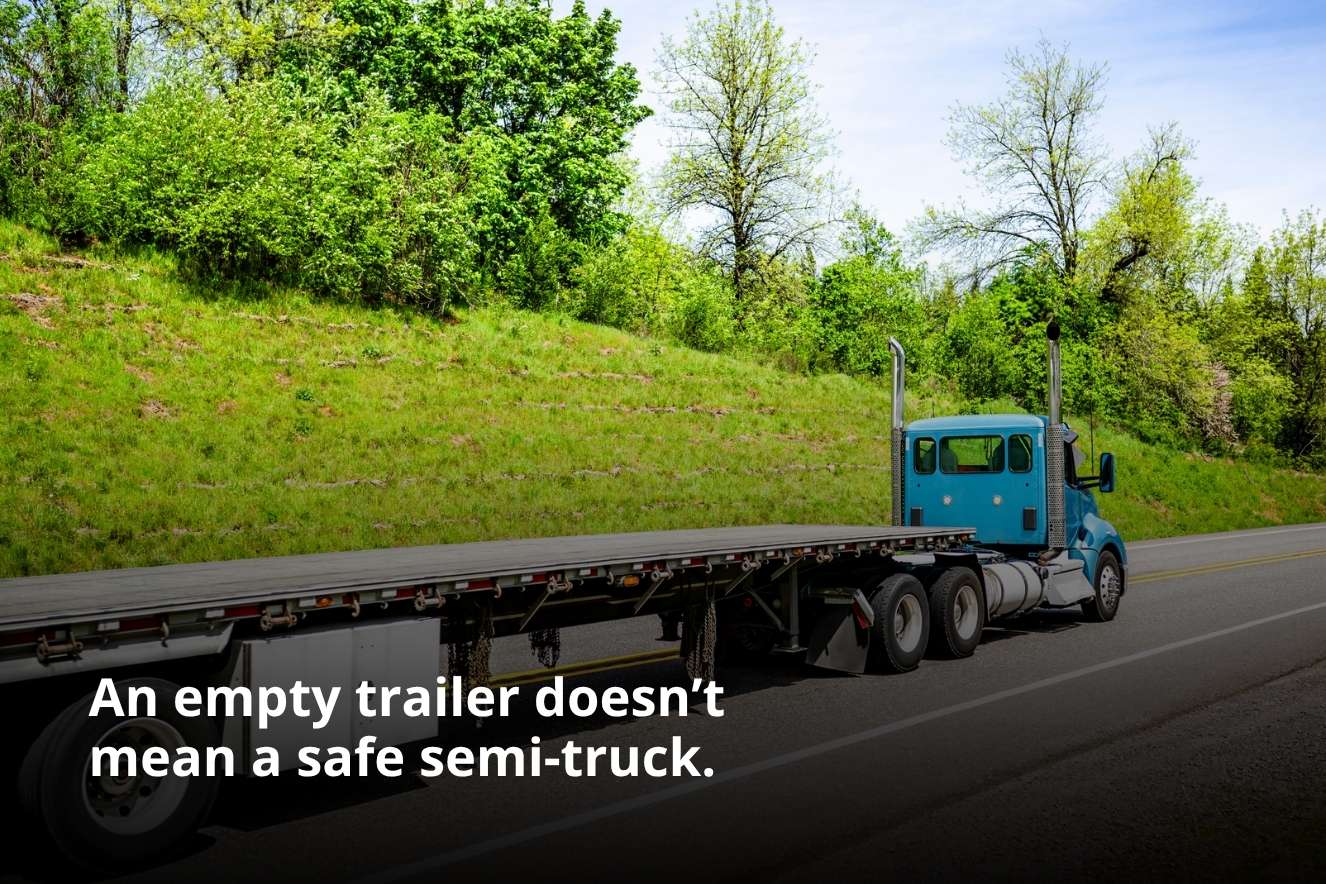 An empty trailer, exemplifying deadhead trucking meaning.