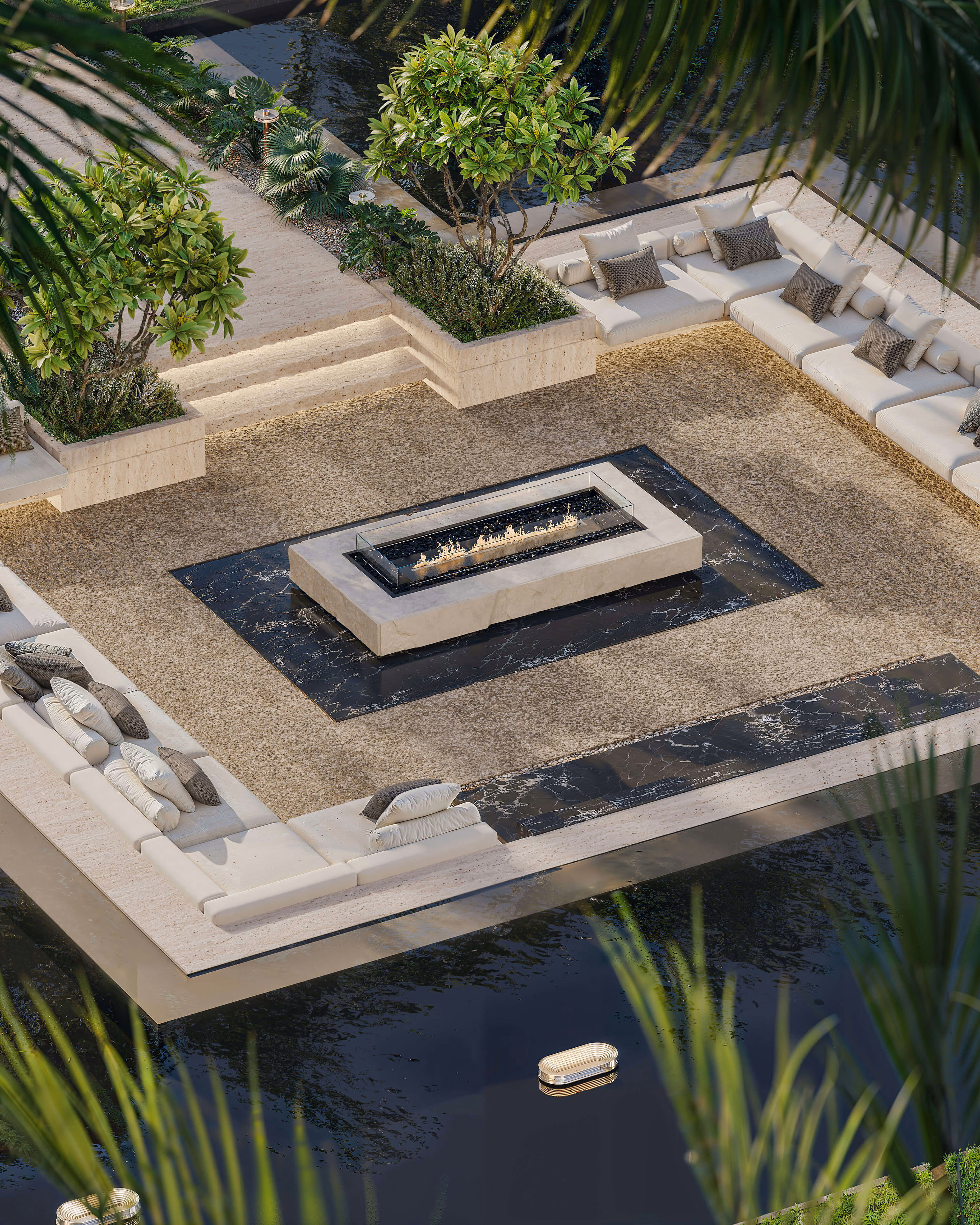 Sunken outdoor lounge with sofas, a central fire feature and surrounding water.