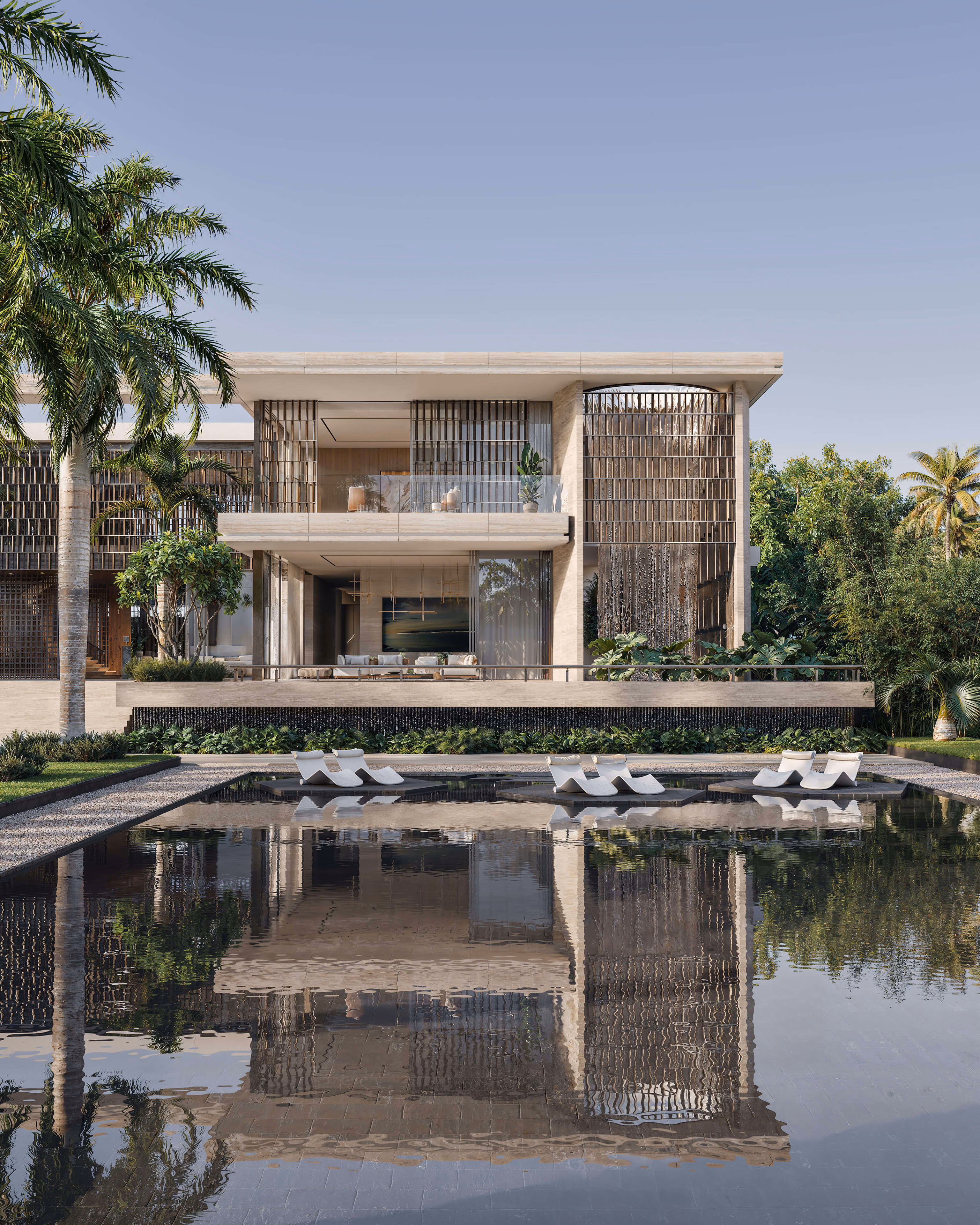 Facade with terraces and screens reflected in the water beside the loungers.