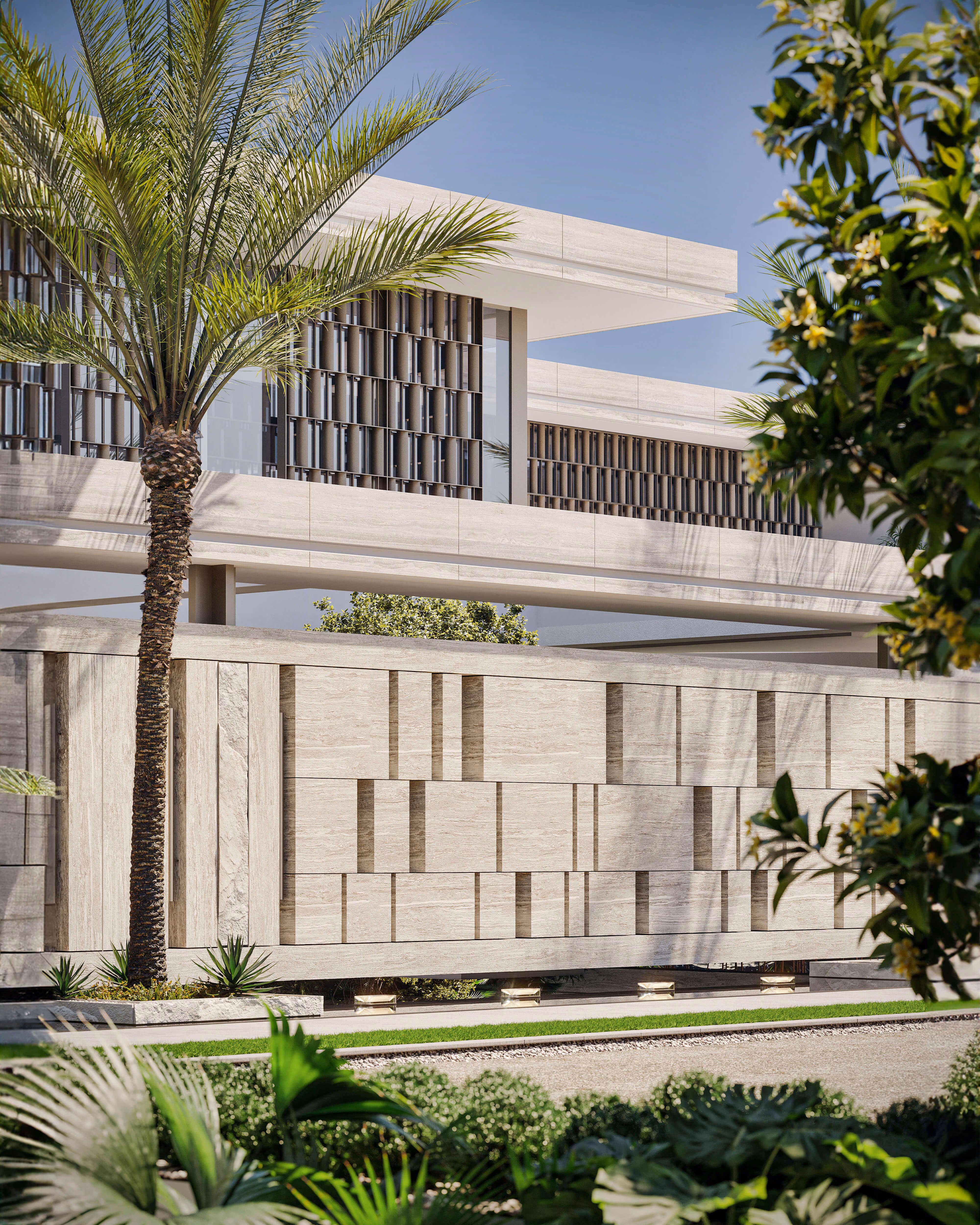 Facade detail with screens, relief panels and a palm in the foreground.