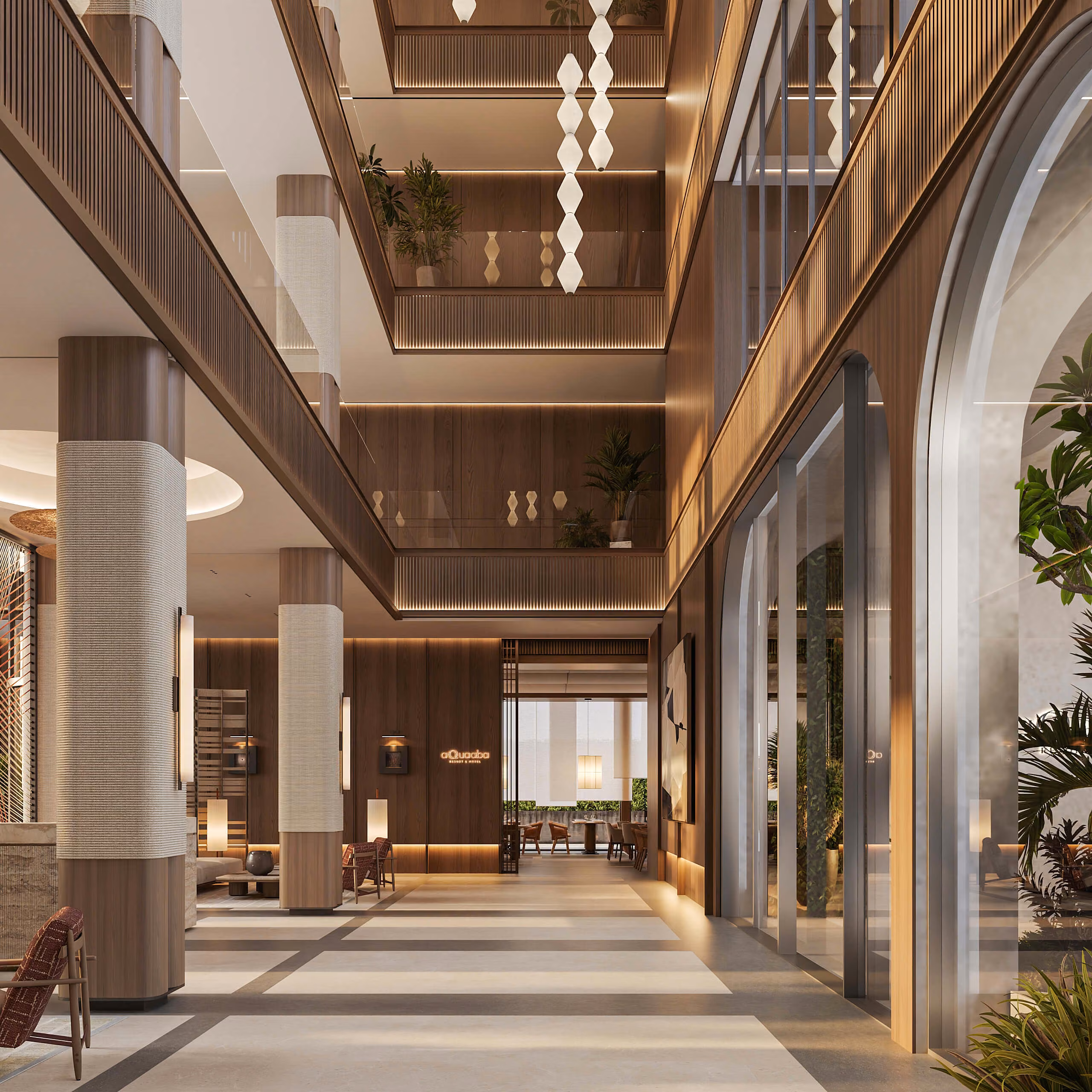 Aqquaaba atrium corridor with columns, pendant lights and open galleries above.