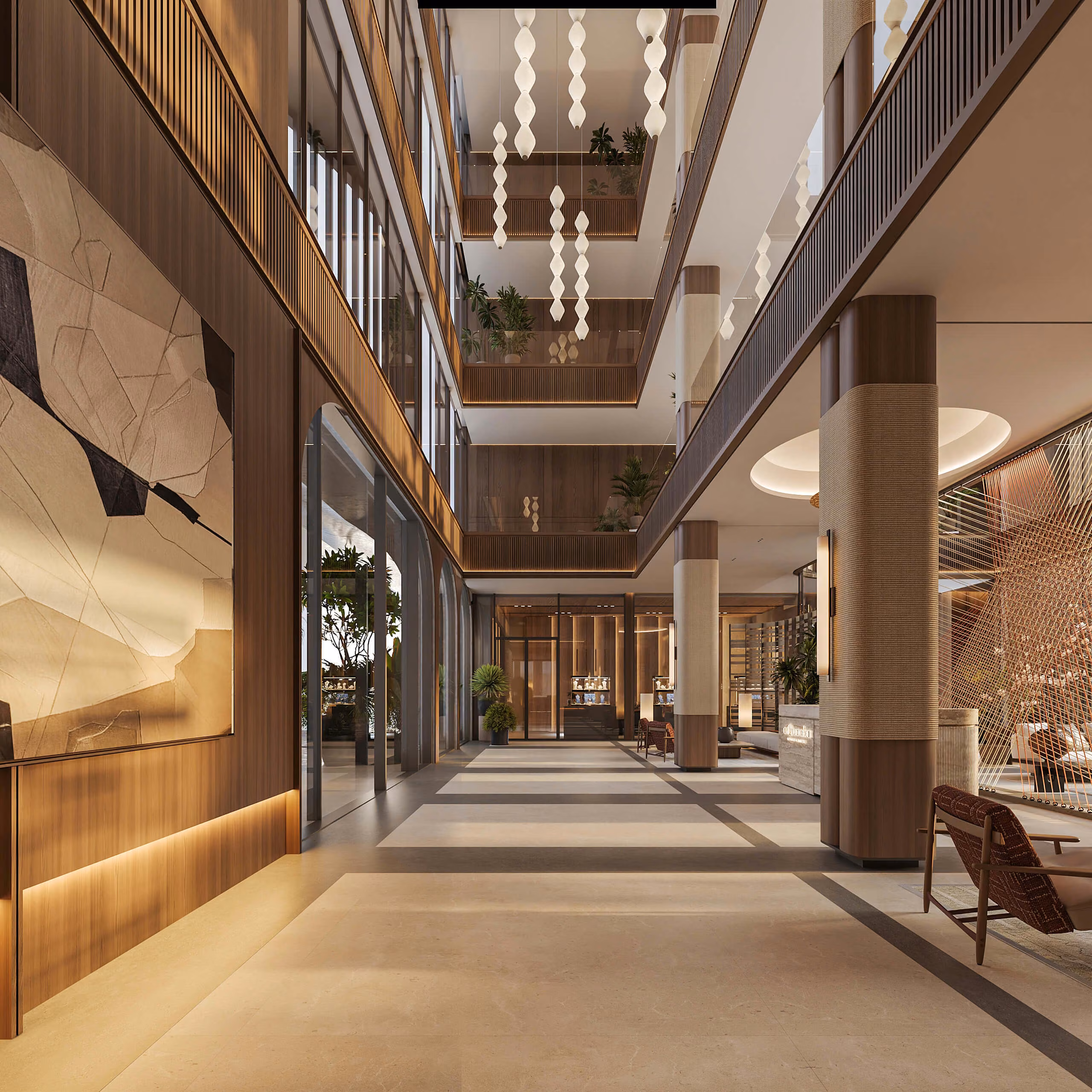 Aqquaaba atrium with several open levels, wood panels and artwork beside the windows.