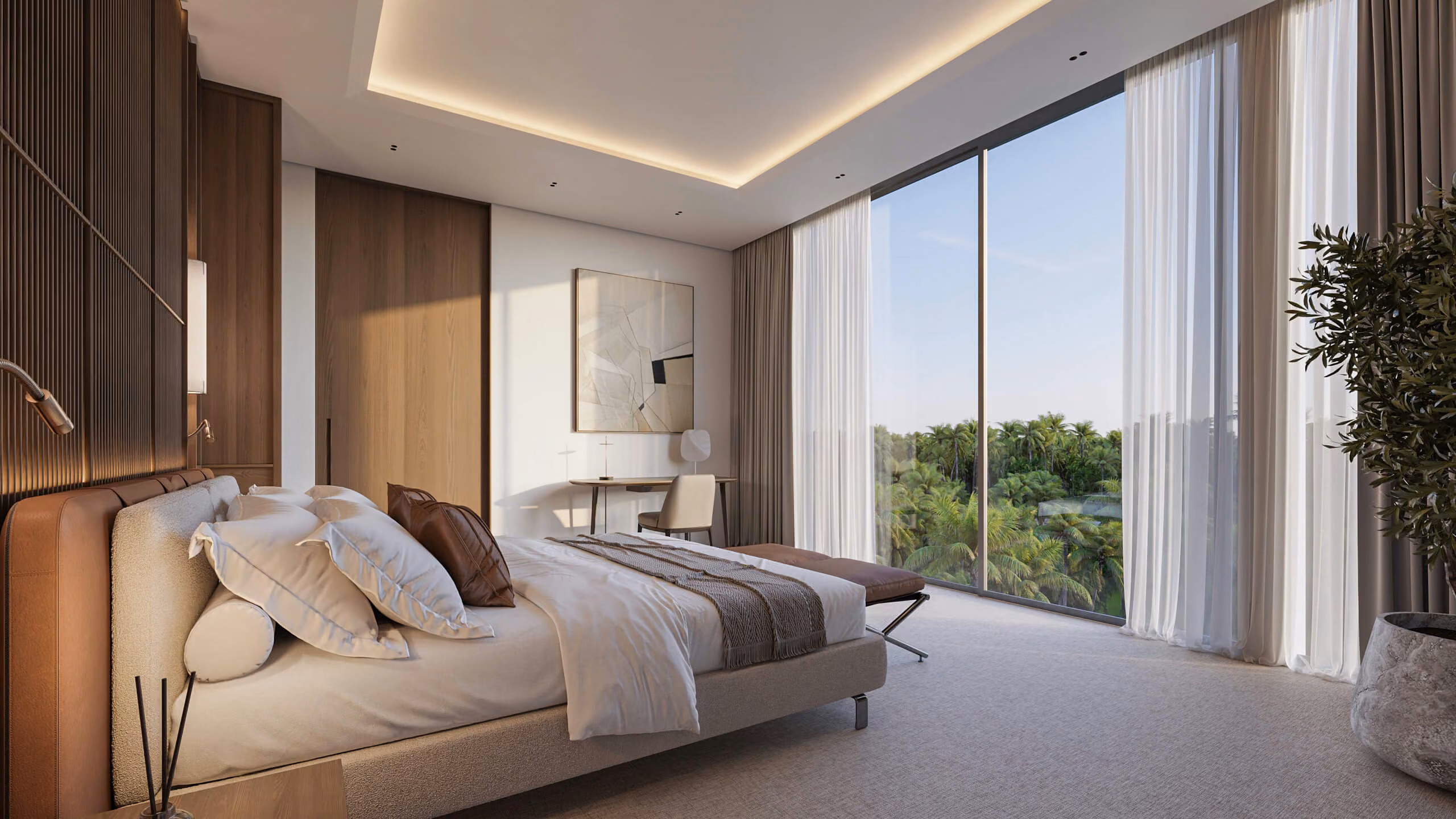 Aqquaaba bedroom with a light-colored bed, desk and floor-to-ceiling window overlooking greenery.
