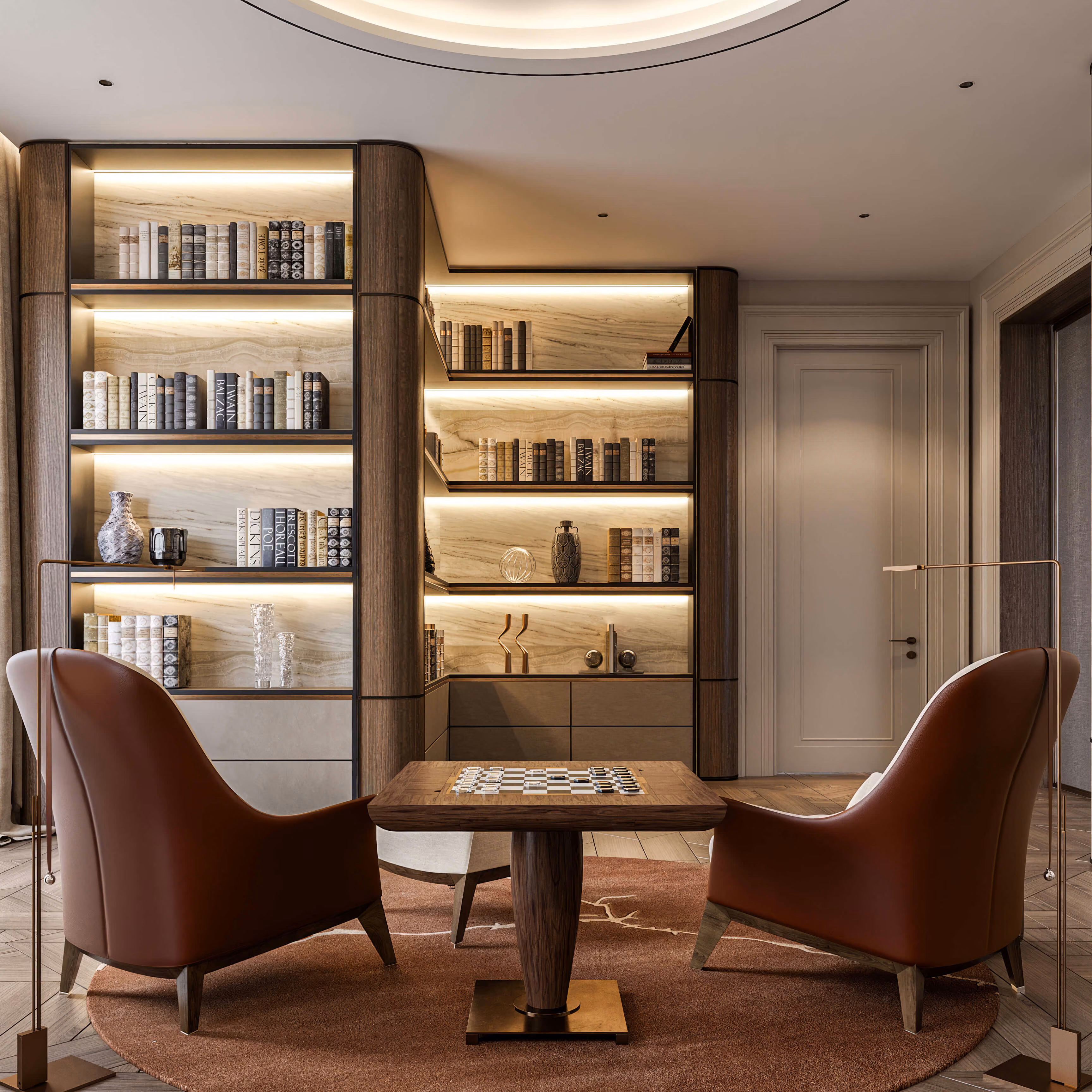 Dos butacas frente a una mesa con tablero de ajedrez y estanterías de libros iluminadas en Alps Residence.