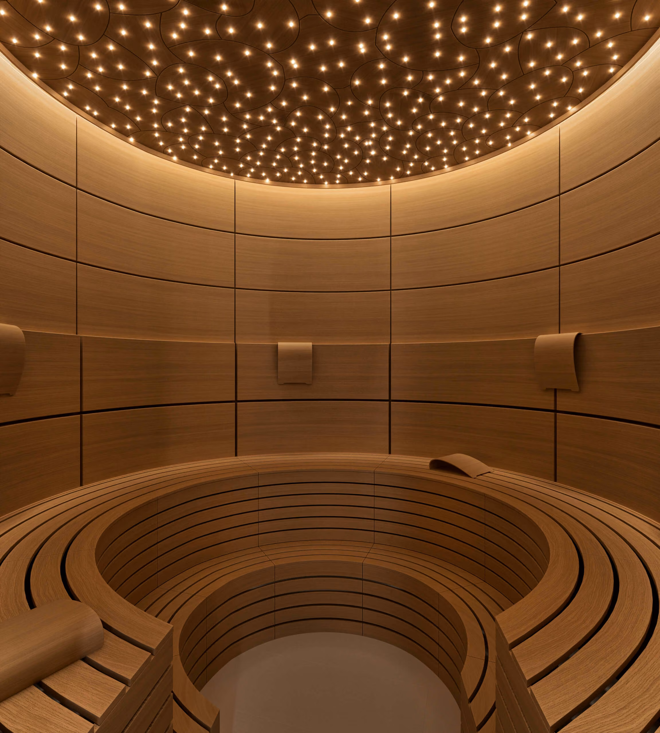 Circular sauna at Vienna Oasis with stepped wood benches and a ceiling of small points of light.