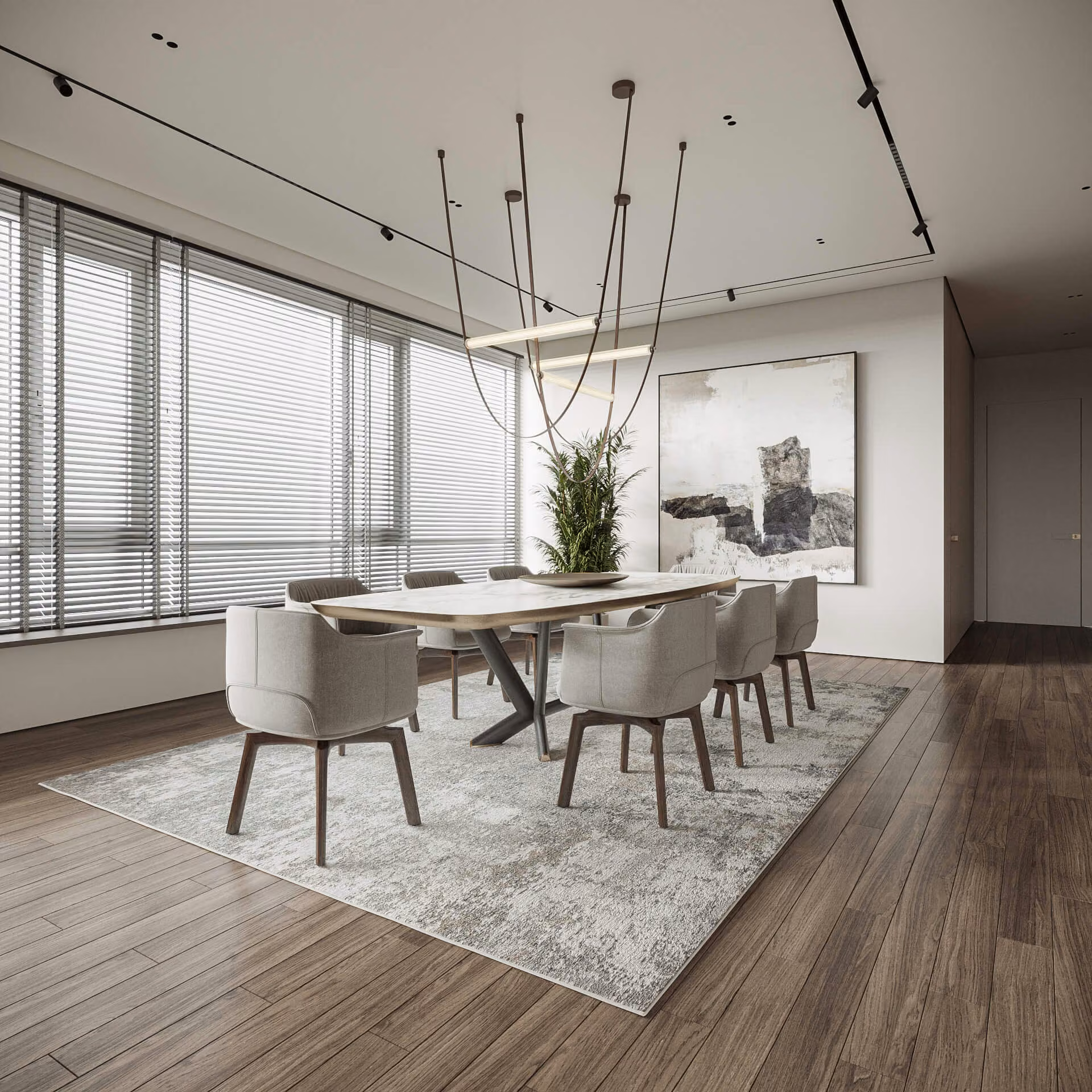 Corner dining room with an oval table, upholstered chairs, abstract art and windows with blinds.