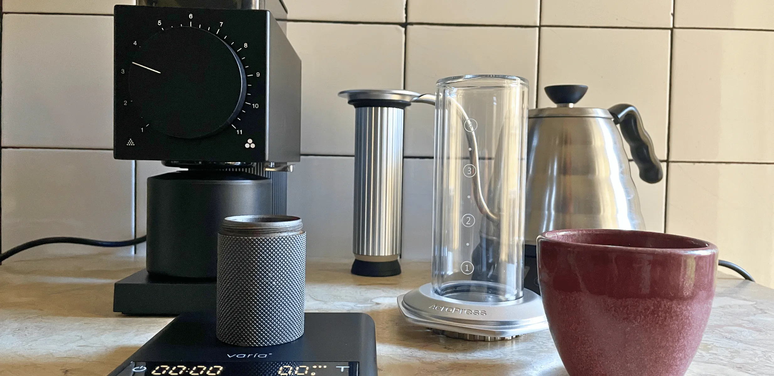 Up close of the Aeropress Premium with Fellow Grinder ready for coffee